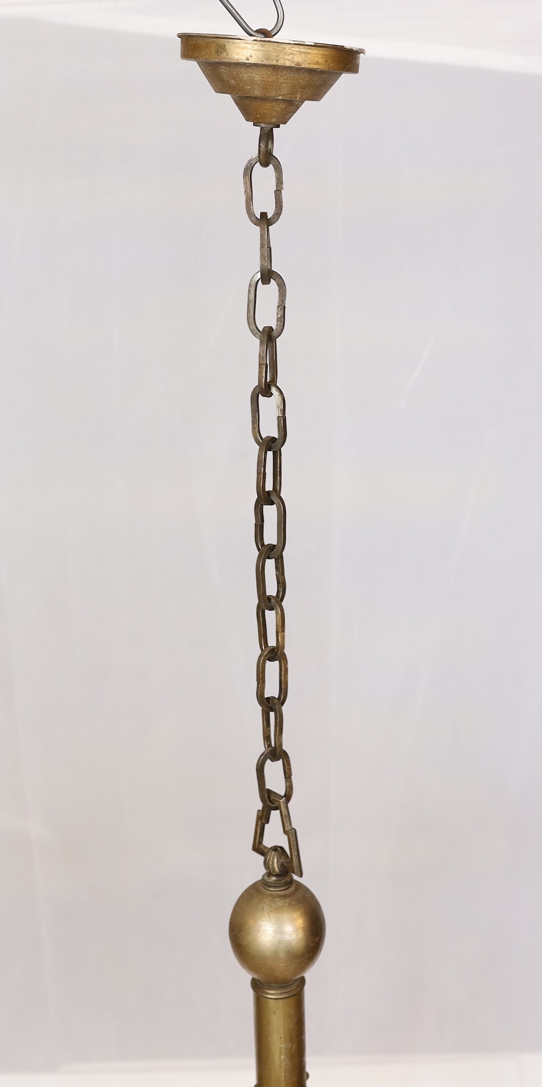 A 1920s-30s German bronze and frosted peach glass five light chandelier of stylish design with geometric cut decoration, drop 75cm. width 70cm